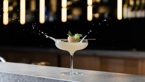a cocktail sitting on a counter with a drink at Presidente InterContinental Mexico City by IHG in Mexico City