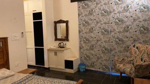 Ванная комната в Bhajan Kala Cottage