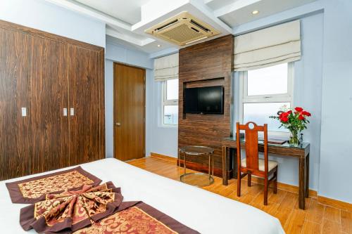 Postel nebo postele na pokoji v ubytování Ocean Waves Resort Cam Ranh