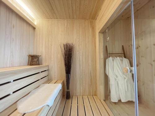 a sauna with a bench in a wooden room at Gapyeong B481 in Gapyeong