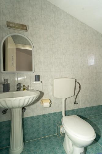 Salle de bains dans l'établissement Alex Studios