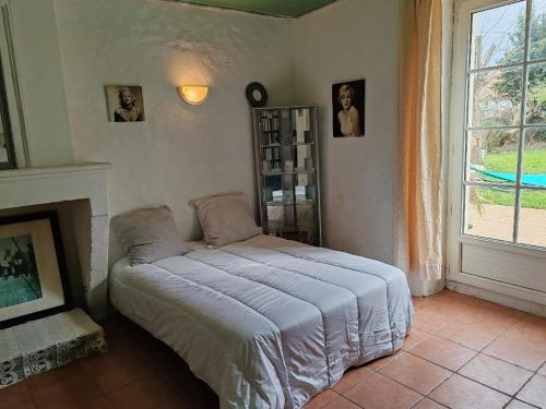 Ένα ή περισσότερα κρεβάτια σε δωμάτιο στο ex domaine Chandelier