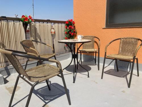 a group of chairs and a table on a patio at 3-min to Station,5BR, 1LR villa near Asakusa, 95平米5间卧室休息好 Stay Dream Hotel in Tokyo