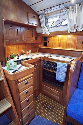 a small kitchen with a sink and a stove at SailHouse in Bari