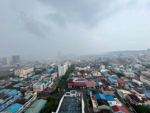 an aerial view of a city with buildings at Citraplaza Apartment Cantik dan mewah in Jodoh