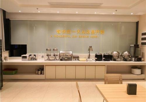 Ресторан / й інші заклади харчування у City Comfort Inn Zhongshan Nanqu Subdistrict Yong'an Square