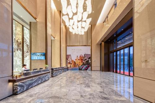 Lobbyen eller receptionen på Poltton International Service Apartment Guangzhou Panyu Government Affairs Center