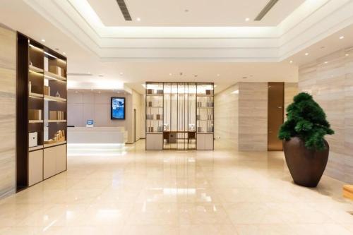 El lobby o recepción de Ji Hotel Suzhou Dushuhu