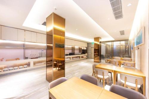 Ji Hotel Suzhou Wujiang Liuhong Road tesisinde bir restoran veya yemek mekanı