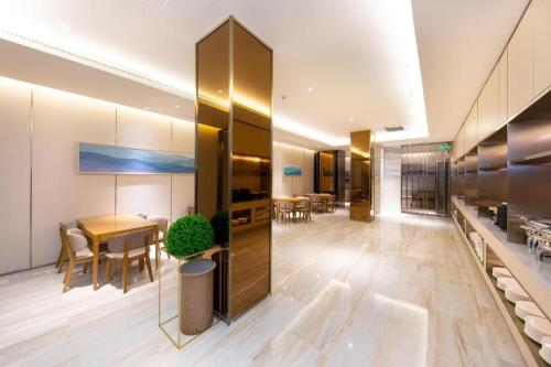 El vestíbulo o zona de recepción de Ji Hotel Suzhou Wujiang Liuhong Road