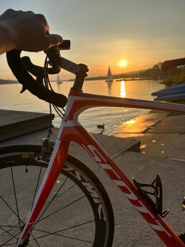 a bike parked in front of a body of water at Willa Wioletta in Tylmanowa