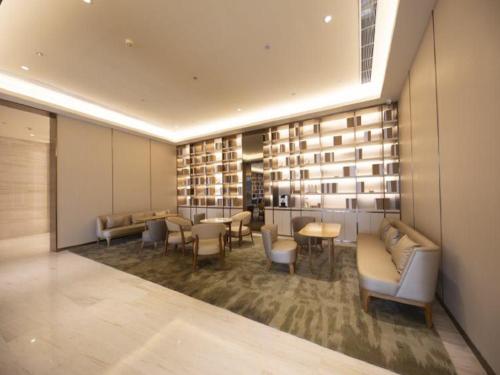 Un lugar para sentarse en Ji Hotel Ji'nan Zhangqiu Baimaiquan