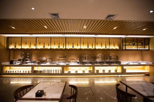 Restaurant ou autre lieu de restauration dans l'établissement Starway Hotel Harbin Xinyang Road