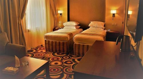 Katil atau katil-katil dalam bilik di فندق بياب العزيزية - Beyab Azizia Hotel