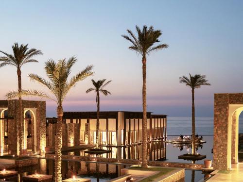 a rendering of a resort with palm trees at Amirandes, A Grecotel Resort to Live in Gouves