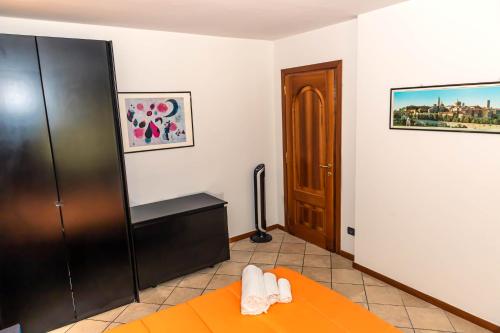 Katil atau katil-katil dalam bilik di Casa Vacanza al Vecchio Ponte
