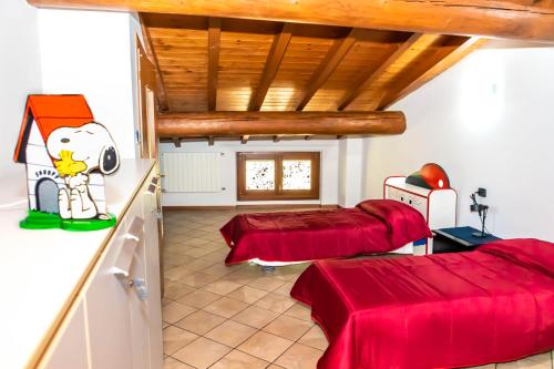 Ένα ή περισσότερα κρεβάτια σε δωμάτιο στο Casa Vacanza al Vecchio Ponte