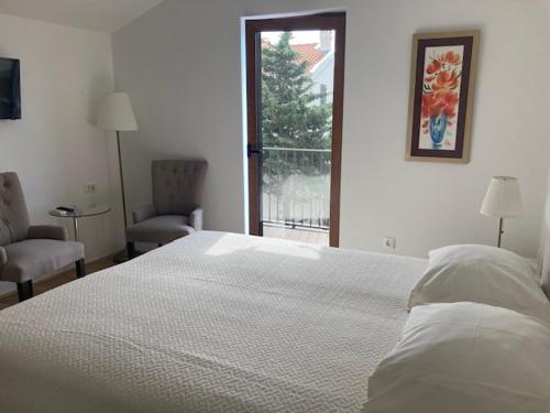 Postel nebo postele na pokoji v ubytování Bed&Breakfast Vanni