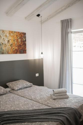 Ένα ή περισσότερα κρεβάτια σε δωμάτιο στο Casa Flavia