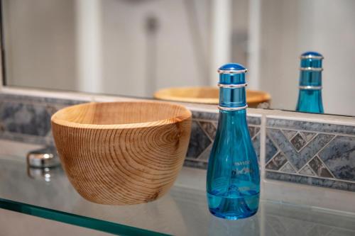 a blue bottle sitting on top of a counter at Joggelehof in Ridanna