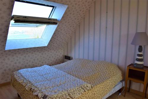 Katil atau katil-katil dalam bilik di Maison VUE SUR MER avec jardin clos à PERROS-GUIREC - Réf 842
