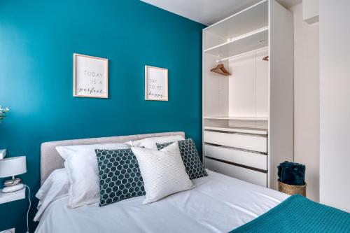 Ένα ή περισσότερα κρεβάτια σε δωμάτιο στο Appartement cosy et calme