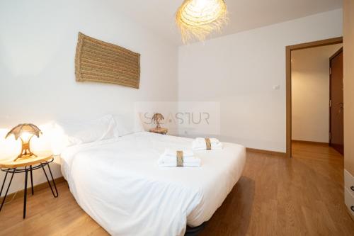 Postel nebo postele na pokoji v ubytování Vive Oviedo I Apartamento