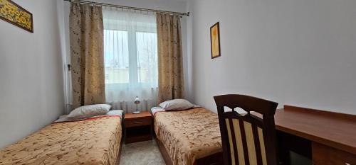 Ein Bett oder Betten in einem Zimmer der Unterkunft Rest Hostel Airport Modlin