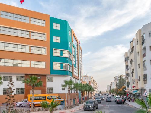 a rendering of a building on a city street at Aliya Luxury Apartment - LA DUNE - AGADIR in Agadir