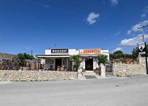 a store on the side of a street at DM-Discover Margarites Home in Margarítai