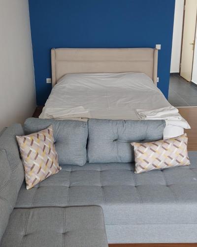 Ένα ή περισσότερα κρεβάτια σε δωμάτιο στο Kordon Apartment