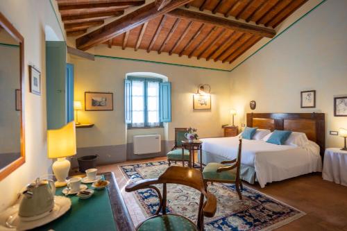 Postel nebo postele na pokoji v ubytování Cortona Resort-Le Terre Dei Cavalieri