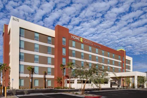 a hotel with a sign on the front of a building at Home2 Suites By Hilton Las Vegas Southwest I-215 Curve in Las Vegas