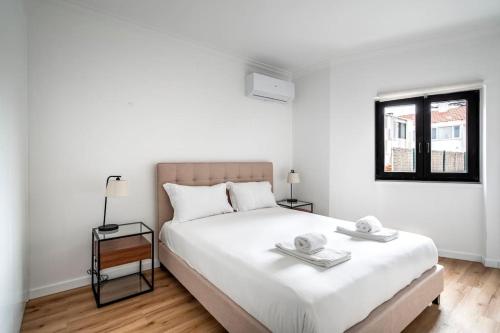Krevet ili kreveti u jedinici u okviru objekta Ocean Breeze: T1 Apartment in Cascais