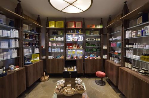 a room with shelves of products in a pharmacy at Hilton Tanger City Center in Tangier