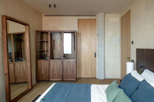 Ένα ή περισσότερα κρεβάτια σε δωμάτιο στο Hotel Ur Bare