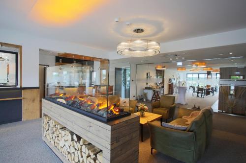 Posezení v ubytování Hotel Grohnder Fährhaus