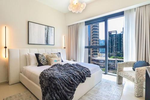 Postel nebo postele na pokoji v ubytování HiGuests - Luxury Living One Bedroom in Downtown Dubai