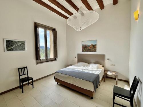 En eller flere senge i et værelse på Mas Rossignol Apartment with 3 Balconies