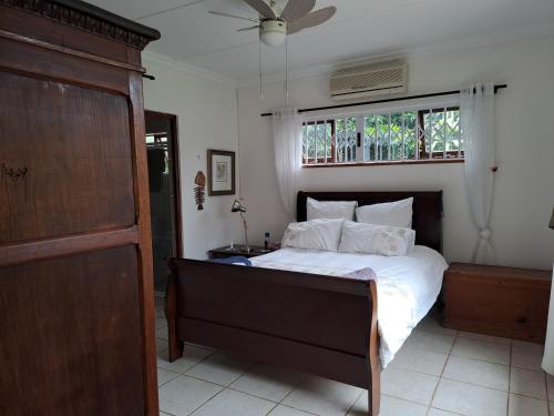 Postel nebo postele na pokoji v ubytování Utopia