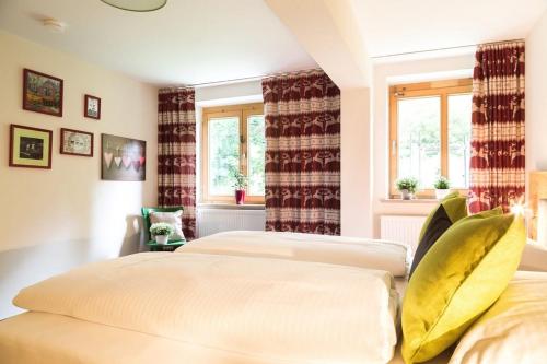 Ένα ή περισσότερα κρεβάτια σε δωμάτιο στο Wildgrün Panorama Lodge 15