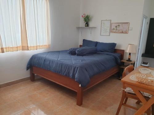 Кровать или кровати в номере Guest Room in Jimbaran