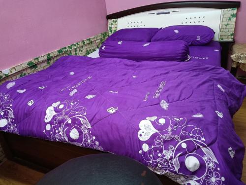 Cama o camas de una habitación en Homestay Bemban Batu Gajah