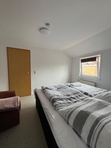 Postel nebo postele na pokoji v ubytování Ferienwohnung ENJOY 6