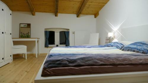 Voodi või voodid majutusasutuse Barther Dachstudio toas