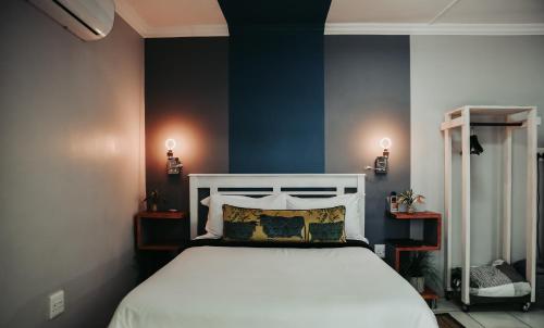 Ένα ή περισσότερα κρεβάτια σε δωμάτιο στο Amaziah Guesthouse