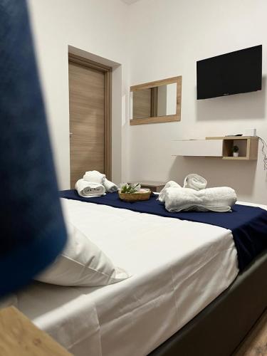 Letto o letti in una camera di Baglio Eldama