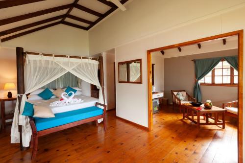 Postel nebo postele na pokoji v ubytování Le Vasseur La Buse Eco Resort