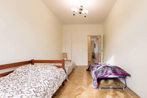 Gulta vai gultas numurā naktsmītnē 4BR Apartment in Tallinn City Centre with free parking