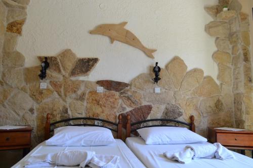 Katil atau katil-katil dalam bilik di Athena Rooms